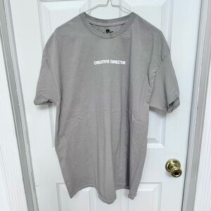 “CREATIVE DIRECTOR” puffy text goodie two sleeves Gray T-Shirt LG